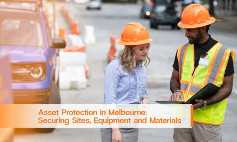 Security professional and site manager reviewing asset protection plans at a Melbourne worksite