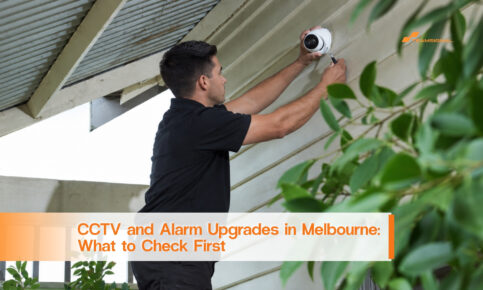Security technician installing an outdoor CCTV camera at a Melbourne property
